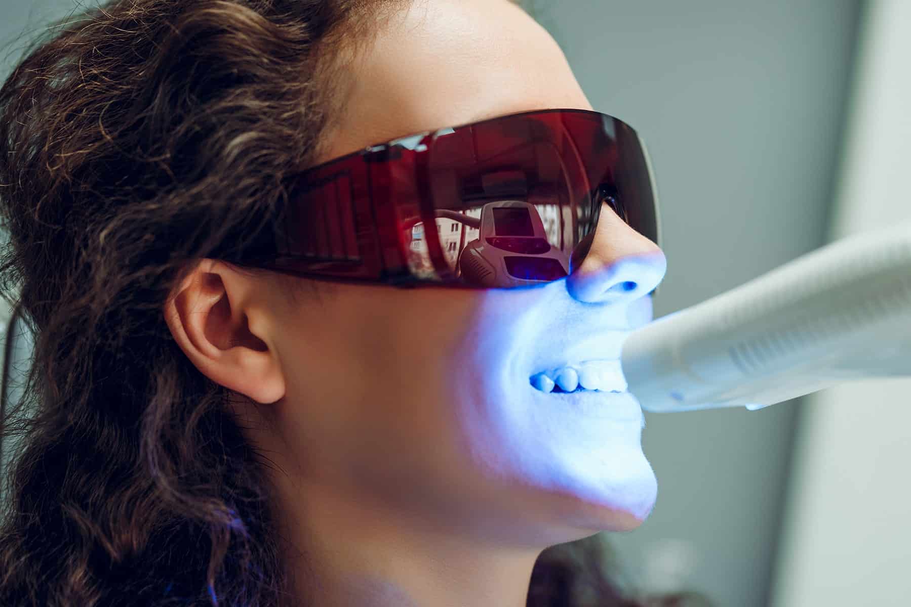 Woman getting treatment for stained teeth in Louisville, CO