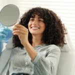 Woman getting dental whitening treatment in Louisville, CO